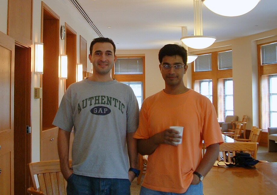 Two collaborators together in a university lounge