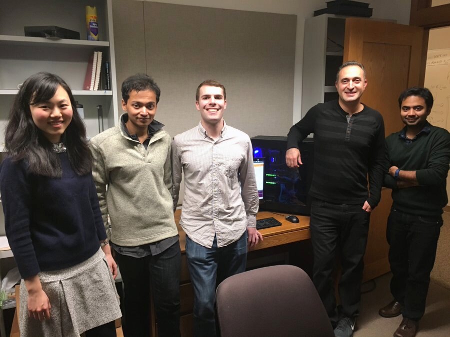 Research group gathered in an office